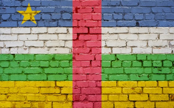 Central African Republic flag on texture brick wall.