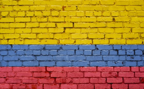 Flag of Columbia painted on brick wall, background texture