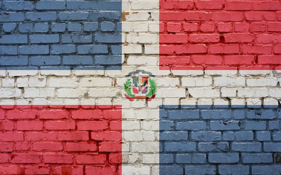 Flag of Dominican Republic painted on brick wall, background 