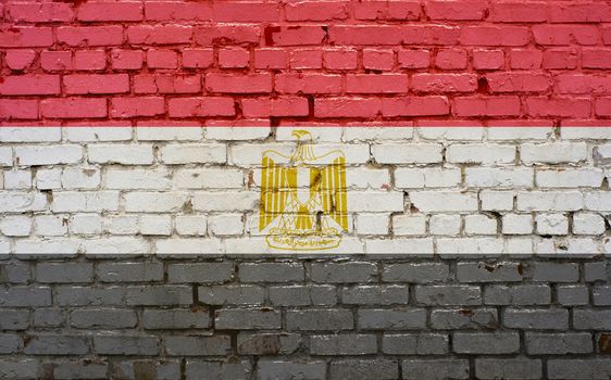 Flag of Egypt painted on brick wall, background texture