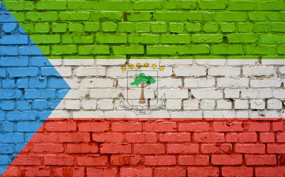 Flag of Equatorial Guinea painted on brick wall, background texture