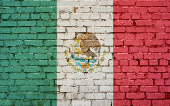 Flag of Mexico painted on brick wall, background texture