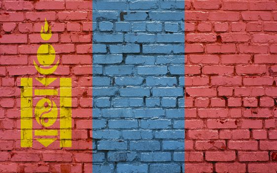 Flag of Mongolia painted on brick wall, background texture