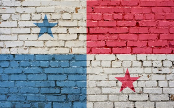 Panama flag on texture brick wall.