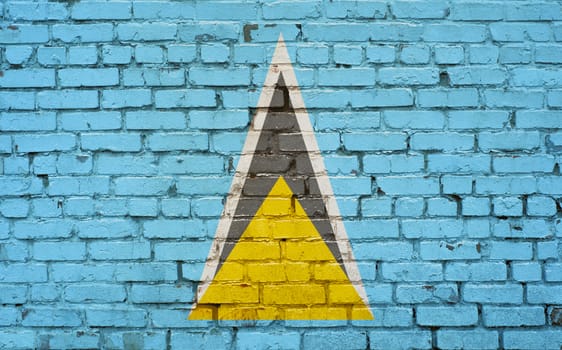 flag of Saint Lucia painted on brick wall