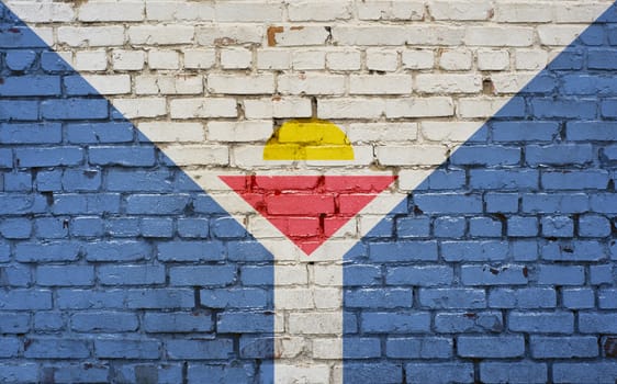 flag of Saint-Martin painted on brick wall