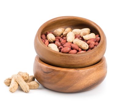 Peanuts in a bowl on a white background.