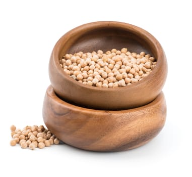 uncooked chickpeas in wooden bowl