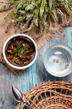 Tea bunch of fresh mint and spoon the custard in rustic style