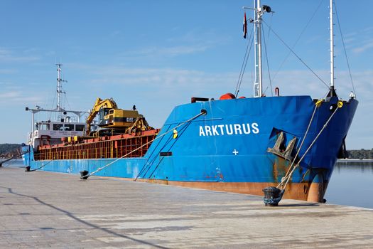 PULA, CROATIA - JANUARY 01, 2016: General cargo ship Arkturus in the port of Pula, built in 1992. and sailing under the flag of Malta.