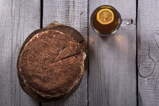 homemade nut cake in a tree with lemon tea