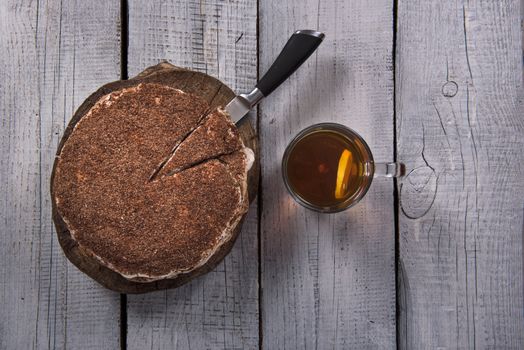 homemade nut cake in a tree with lemon tea