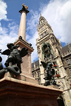 The Golden statue of Mary (Mariensaule), a Marian column on the Marienplatz in Munich, German