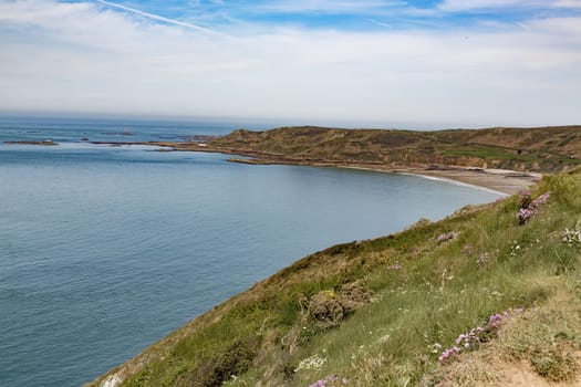 Beautiful coastline beach san ocean grass France