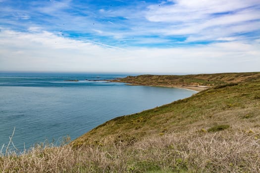 Beautiful coastline beach san ocean grass France