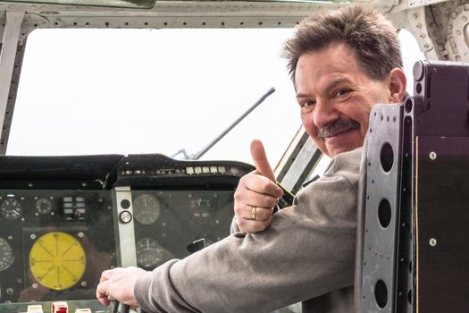 Fun in the cockpit of an old propeller aircraft