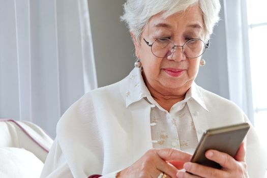 Senior woman using her mobile phone.