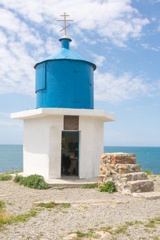 Big Utrish, Russia - May 17 2016: Chapel at the monument-Utrish lighthouse on the island, built in 1975 in tribute to all sailors Azov-Black Sea fleet, as well as the crew of the vehicle "Fabricius" vessel, which in World War II was torpedoed by the Germans