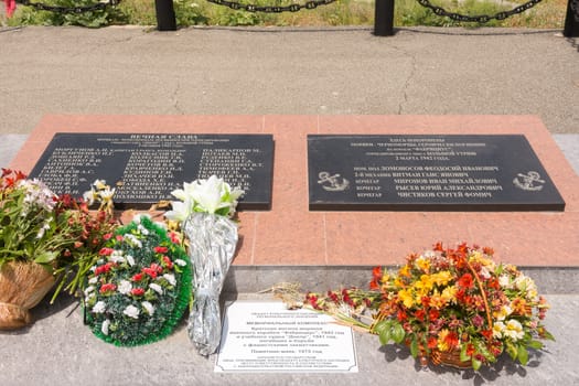 Big Utrish, Russia - May 17, 2016: Commemorative plate of the memorial complex on the island of Utrish, on the site of a mass grave sailors warship "Fabricius" and academic "Dnepr" vessel died in the struggle against the German invaders