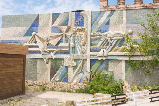 Big Utrish, Russia - May 17, 2016: Stylized wall mosaic with the words "Big Utrish" at the entrance to the Cape resort village on the outskirts of Big Utrish Anapa