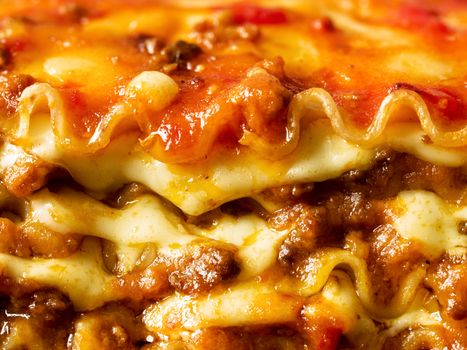 close up of rustic italian cheesy lasagna pasta