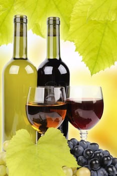 Wine bottle, glass and grapes on background