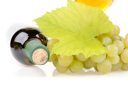 Wine bottle, glass and grapes isolated on white background