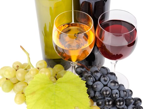 Wine bottle, glass and grapes isolated on white background