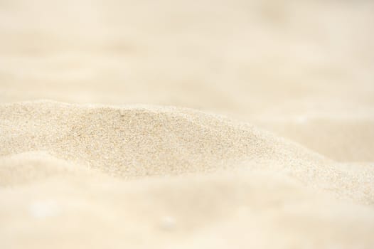 Closeup of sand pattern of a beach in the summer