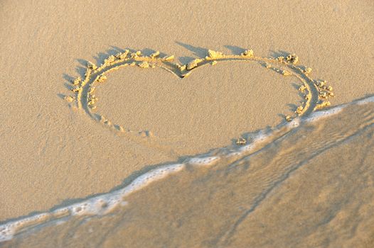 Heart in sand on a beach