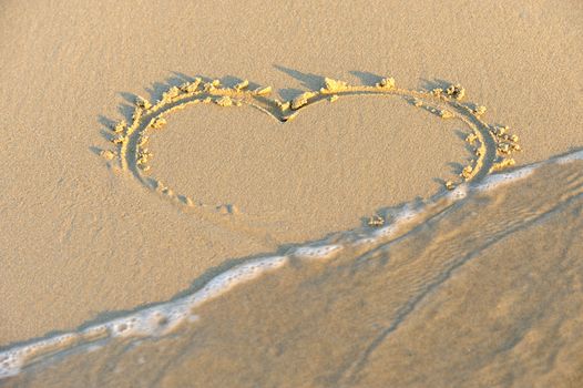 Heart in sand on a beach