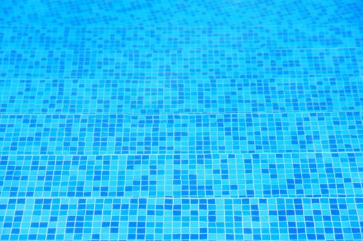 Swimming pool with stair at hotel close up