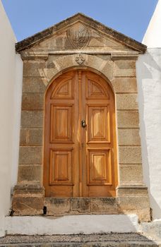 Iconic mansion door in the village, Rhodos island, Greece