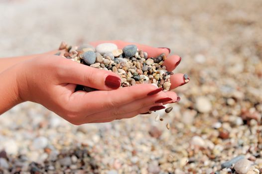 Handful of stones in hands