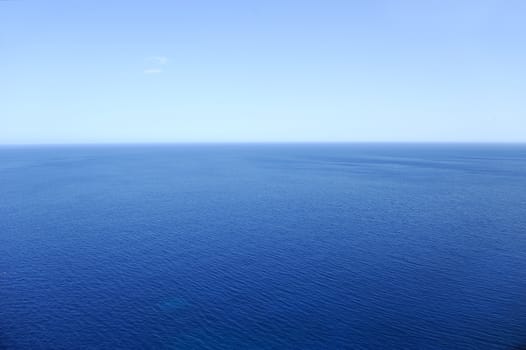 Clear blue sea surface with ripples