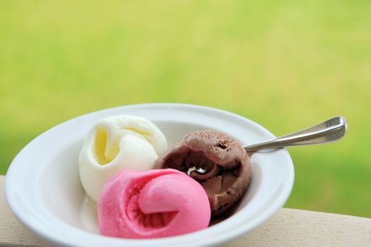 Three scoops of ice cream in plate