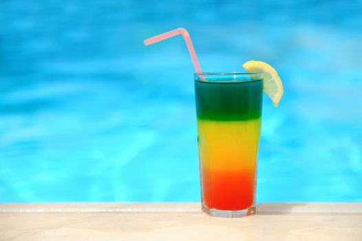 Cocktail on the background of the pool