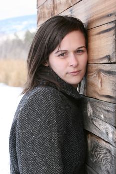 Adult brunette female in a rural setting 