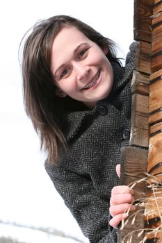 Adult brunette female in a rural setting