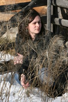 Adult brunette female in a rural setting