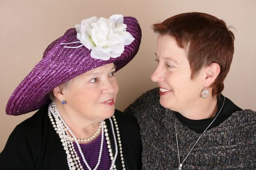 Beautiful mother and daughter in a studio setting