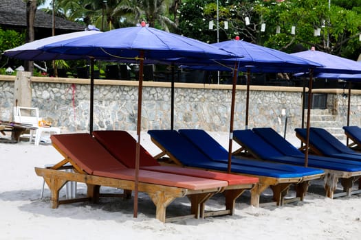 umbrellas and deckchairs against of seascape under blue sky. Beach  Hua Hin