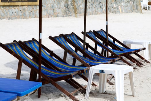 umbrellas and deckchairs against of seascape under blue sky. Beach  Hua Hin