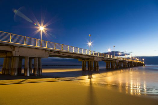 View of a pier marine with lights on and shooting with long time