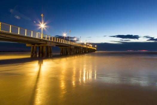 View of a pier marine with lights on and shooting with long time