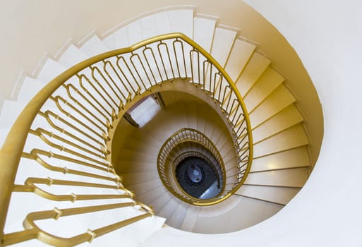 View from the top of a spiral staircase of an old Tuscan home