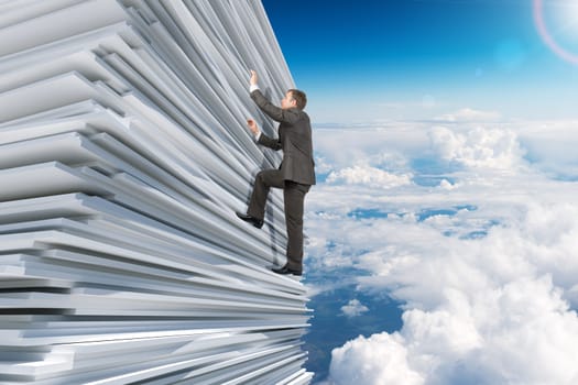 Businessman climbing up a huge stack of paper with sky background