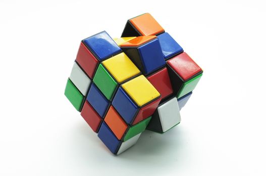 Colorful puzzle Cube isolated on white background, magic cube