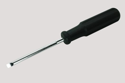 Black screwdriver isolated on gray background