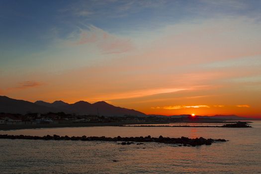 Special vision from the jetty of Marina di Massa to dawn of the new year